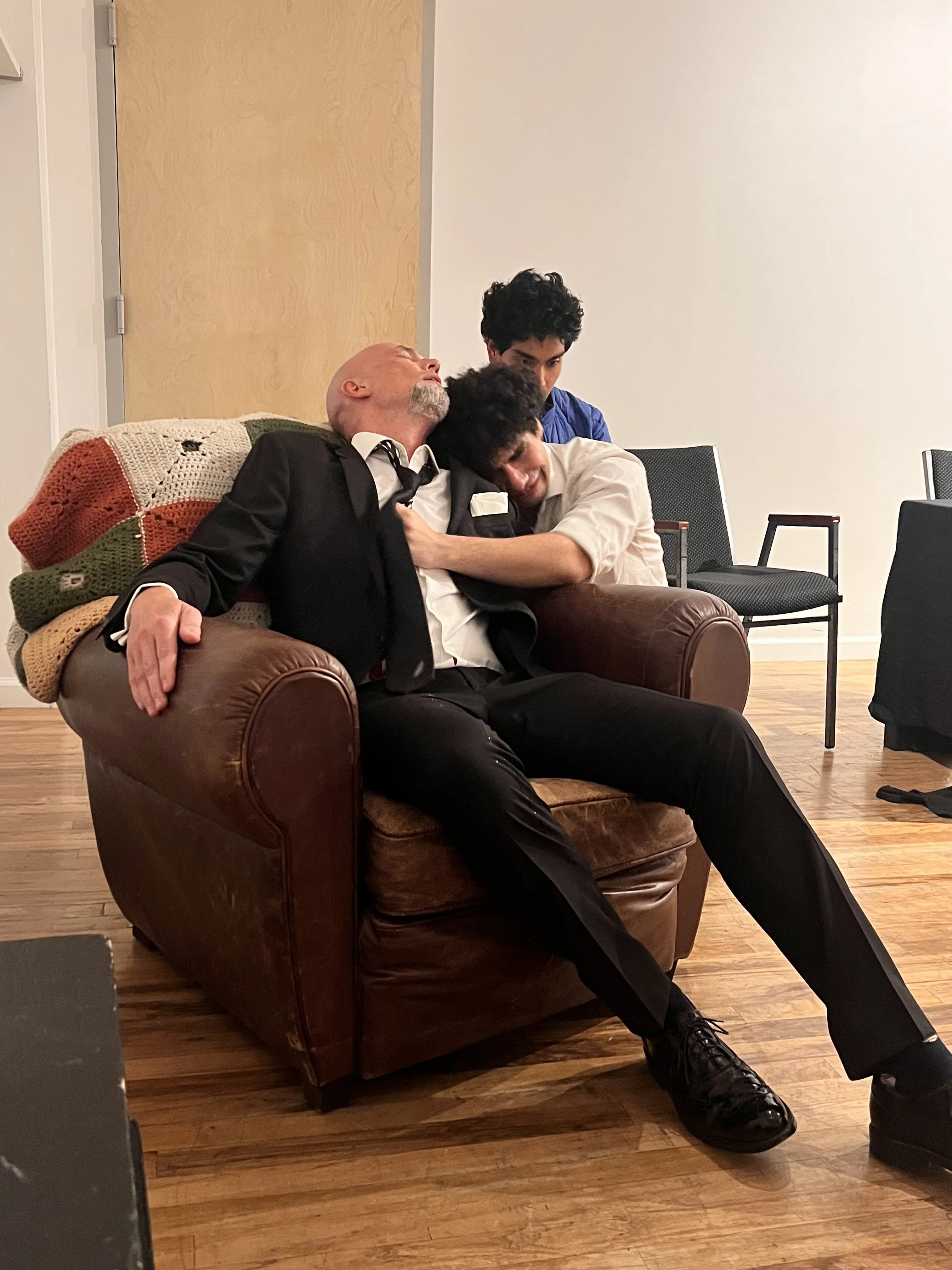 Three men in conversation - acting scene